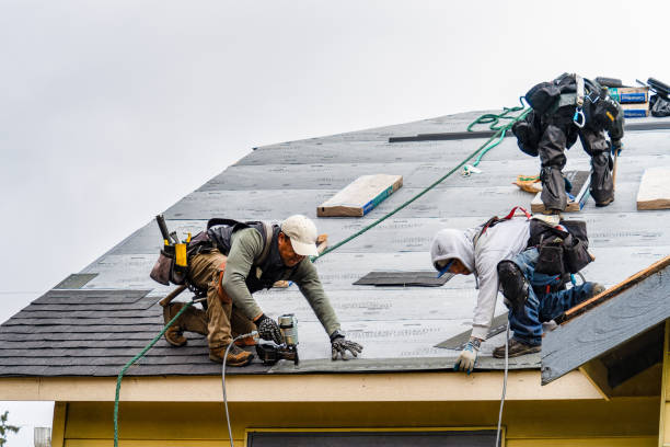 Professional Gutter Installation technician working in Cleveland, OK